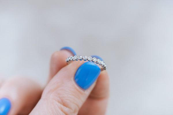 BERTOLLE || half-eternity bezel diamond band