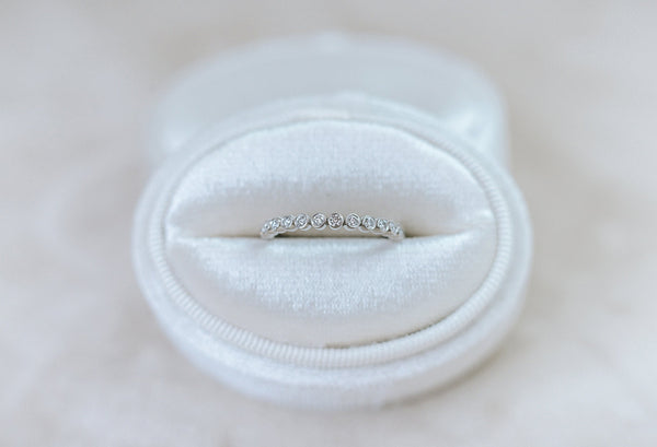 BERTOLLE || half-eternity bezel diamond band