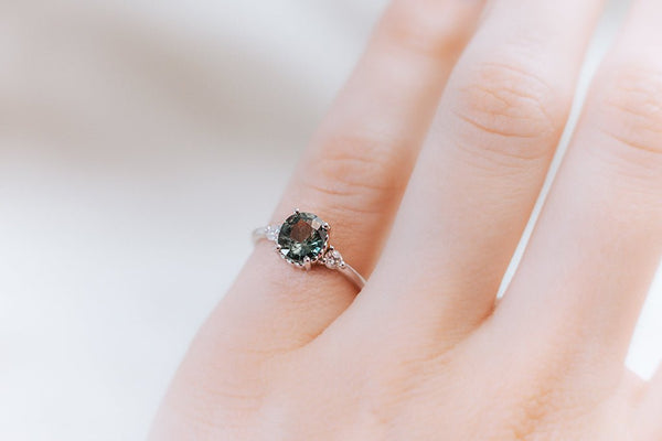 DELPHINE || 1.3ct oval green sapphire and diamonds ring