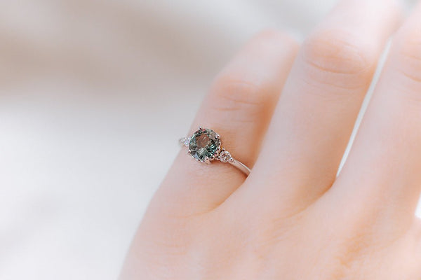 DELPHINE || 1.3ct oval green sapphire and diamonds ring