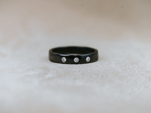 NIOBI || black niobium ring with diamonds
