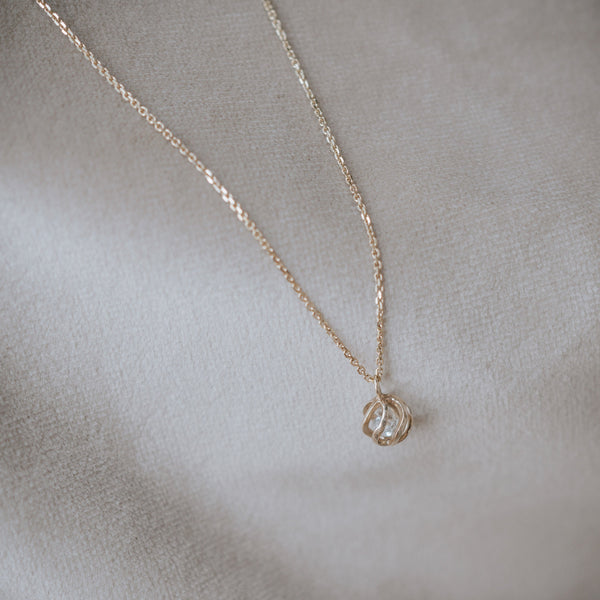 DIAMONDS IN THE CAGE gold necklace with diamonds