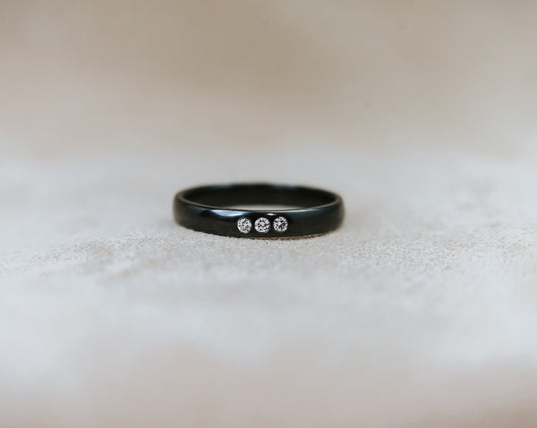 NIOBI || black niobium ring with diamonds