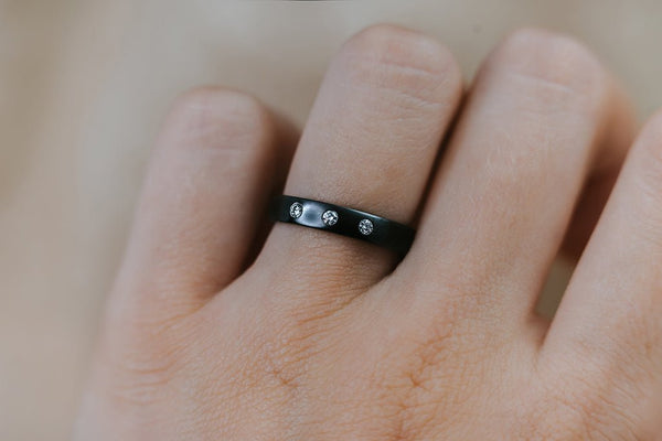 NIOBI || black niobium ring with diamonds